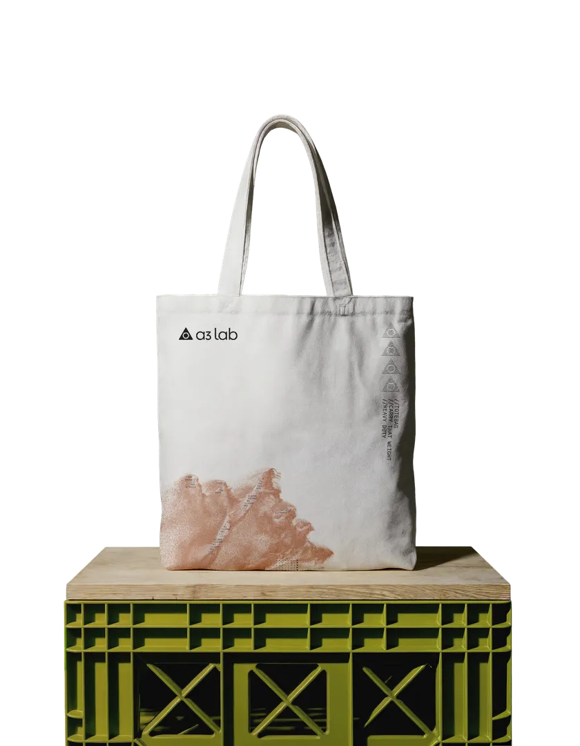 Canvas tote bag with terracotta dithered print and specification text